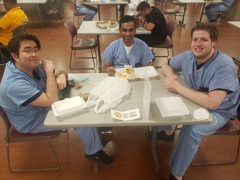 PGY3 Residents at Lunch in Cafeteria Three PGY3 Residents at Lunch in Cafeteria